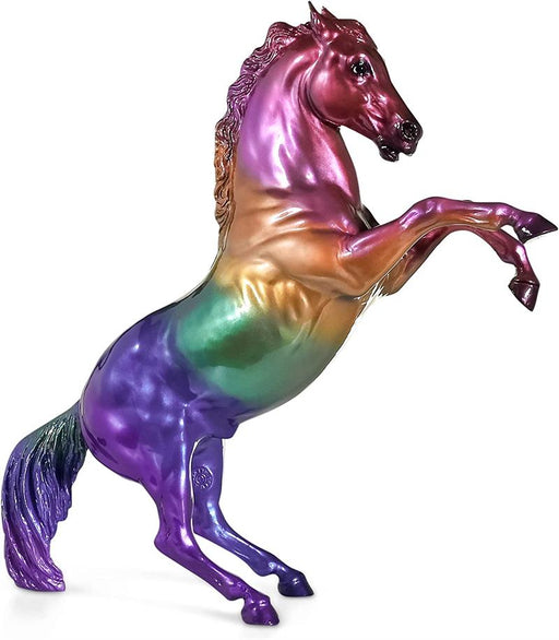 A rainbow is always a special sight to behold, but when it appears on a fiery rearing horse, it becomes something truly spectacular! This impressive stallions coat is decorated with rich jewel-toned hues that together make up an exquisite rainbow.