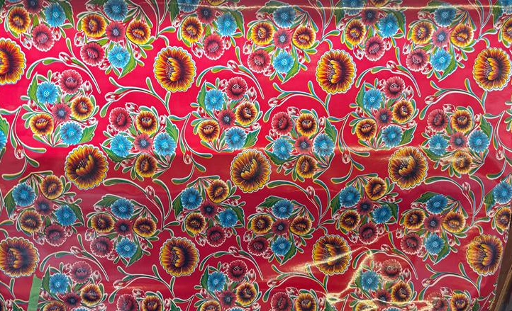 Blooms on Red Oilcloth Fabric by the Yard - 47.5" Wide